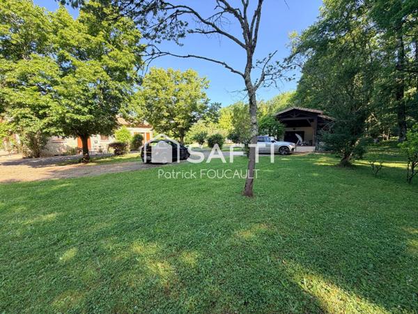 Ensemble immobilier de 3 Maisons sur terrain boisé