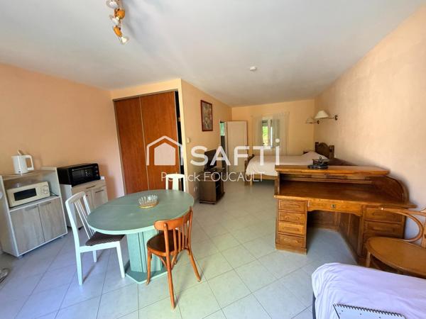 Ensemble immobilier de 3 Maisons sur terrain boisé