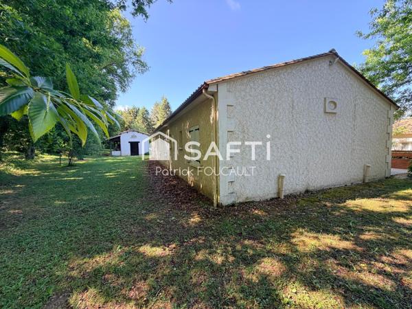 Ensemble immobilier de 3 Maisons sur terrain boisé