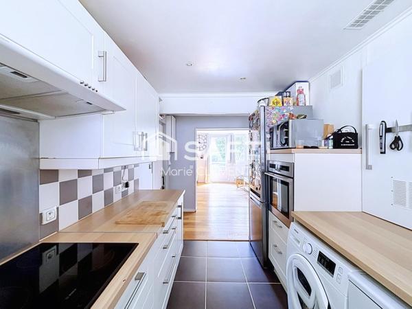 Appartement de 83 m2, 3 chambres, cave et parking