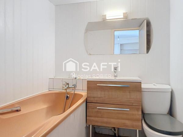 Maison de ville en pierre cinq chambres et jardin proche gare TGV et commerces !!