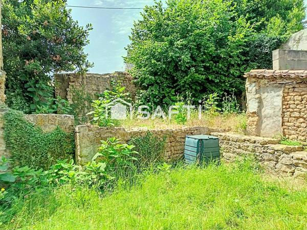 Maison de ville en pierre cinq chambres et jardin proche gare TGV et commerces !!