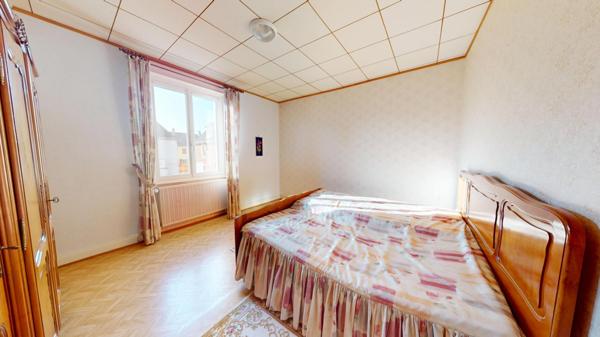 Maison familiale 6 pièces – 115 m² avec jardin et garage – Mulhouse secteur résidentiel