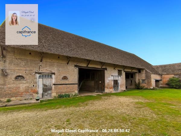 Maison de Maitre sur plus d'1,4 hectare + dépendances