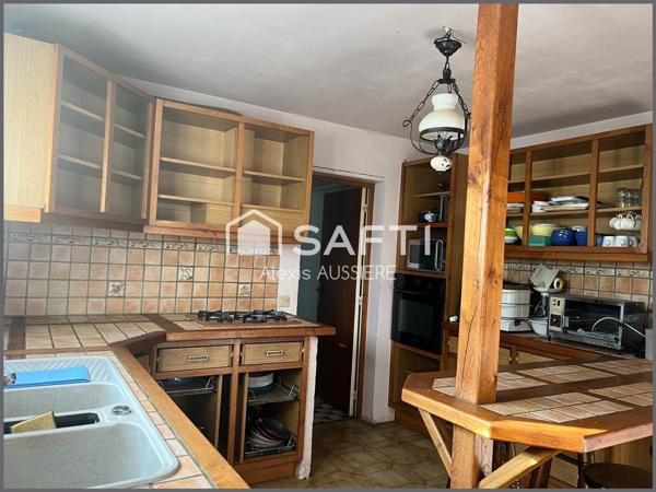 MAISON CENTRE VILLE 232 M2 UTILE+ TERRAIN DE 596 M2