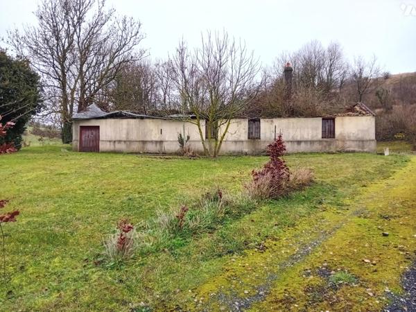 Terrain édifié d'un bâti sinistré.