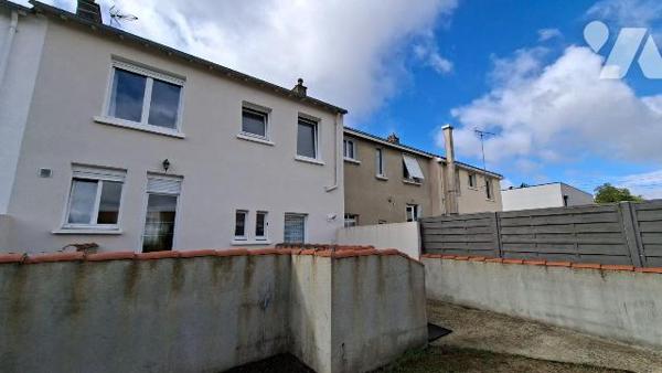 Maison familiale avec jardin et garage dans un quartier calme et agréable de Cholet, cette mais...