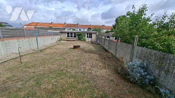 Maison familiale avec jardin et garage dans un quartier calme et agréable de Cholet, cette mais...
