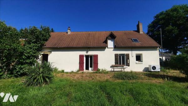 Maison avec parc et petit plan d'eau