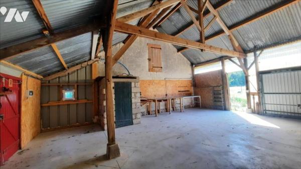 Maison avec parc et petit plan d'eau