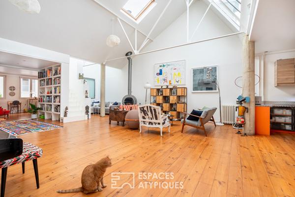 Loft traversant avec verrières zénithales