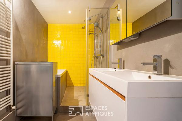 Loft traversant avec verrières zénithales