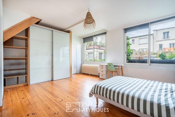Loft traversant avec verrières zénithales