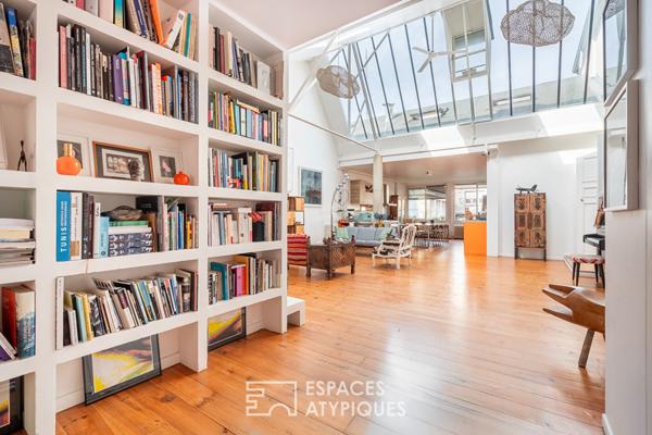 Loft traversant avec verrières zénithales