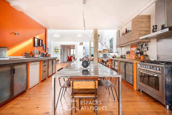 Loft traversant avec verrières zénithales