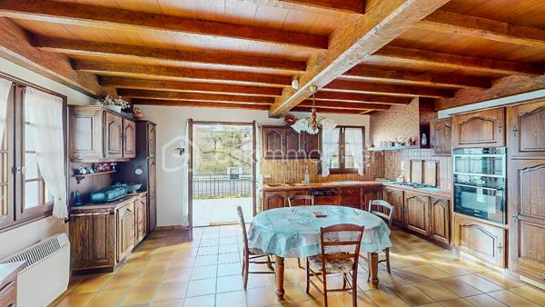 Située à Viodos-Abense-de-Bas à seulement 4mn de Mauléon, découvrez
cette charmante bâtisse Basque de 231m² habitable sur 3 niveaux édifiée 
sur une parcelle plate de 948m².

                - VISITE VIRTUELLE GRATUITE - SUR DEMANDE -

IMPORTANT : Possibilité d'acquérir en plus la parcelle constructible limitrophe de 959m².

Le RDC vous offre une belle entrée, une cuisine séparée de 26m² en accès 
direct sur une grande terrasse de 30m² en exposition Sud-Ouest, un séjour
avec sa cheminée, 3 chambres et une salle de bain.

À l'étage vous bénéficiez de 4 chambres, d'une cuisine séparée, d'une salle de bain +
douche, d'un WC ainsi que d'une belle pièce de 29m² pouvant servir de salon/
salle à manger ou salle de jeux.

Le sous-sol total de 159m² environ avec une double entrée, équipé également d'une cuisine 
et d'une douche, vous permettra de l'utiliser à votre guise (stationnement pour vos voitures, 
rangement, salle de jeux etc...).

Côté extérieur : Beau jardin plat et arboré entièrement clôturé, 2 terrasses, puits alimentant les WC
et machine à laver.

Côté technique : Assainissement collectif, chauffage au gaz, électricité et cheminée, 
production d'eau chaude par cumulus, huisserie bois, double ou survitrage.
Possibilité de raccordement à la fibre.

Les Plus : Secteur calme - Vue dégagée - Sous-sol pouvant servir à une activité artisanale 

Avec une remise au goût du jour intérieur, cette maison érigée avec des matériaux 
de qualité sera parfaite pour une belle vie de famille !

Je suis à votre écoute 7jours/7, je m'adapte à votre planning.