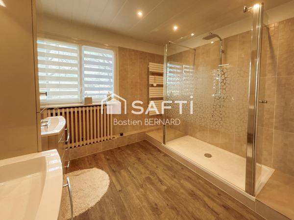 Maison standing 4 chambres – grand terrain arboré – sous-sol total