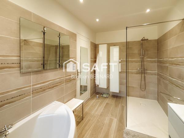 Maison standing 4 chambres – grand terrain arboré – sous-sol total