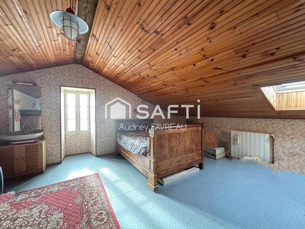 Ancienne école de 185m2, 4 chambres,jardin,garage