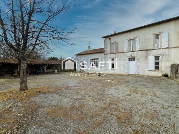 Ancienne école de 185m2, 4 chambres,jardin,garage