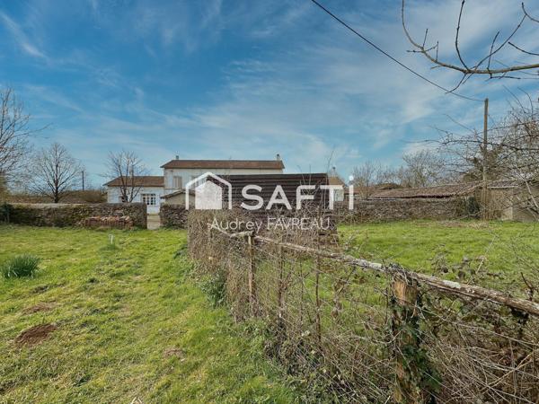 Ancienne école de 185m2, 4 chambres,jardin,garage