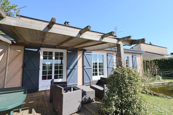Maison à vendre 7 pièces de 130m² avec piscine, jardin et garage