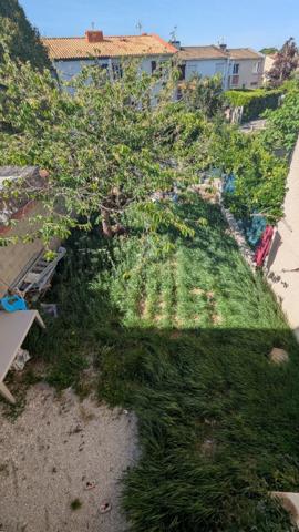 LAUNAGUET  Centre  Maison T4 avec jardin et garage