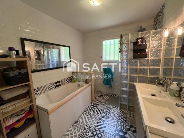 Maison de plain-pied de 123m2 sur un terrain de 2221m2 constructible