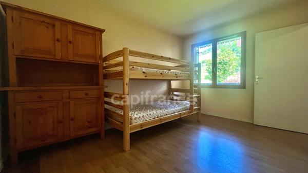 A vendre : Appartement 2 pièces de 36m2 avec balcon et cave dans un cadre d'exception en plein coeur de MANIGOD (74) - Vue montagnes