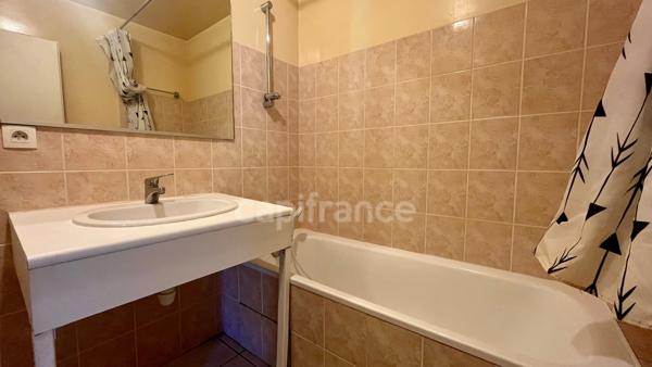 A vendre : Appartement 2 pièces de 36m2 avec balcon et cave dans un cadre d'exception en plein coeur de MANIGOD (74) - Vue montagnes