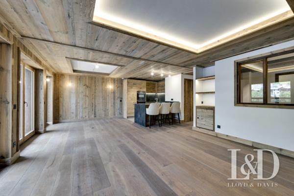 Appartement raffiné dans chalet intimiste, calme absolu à deux pas du centre