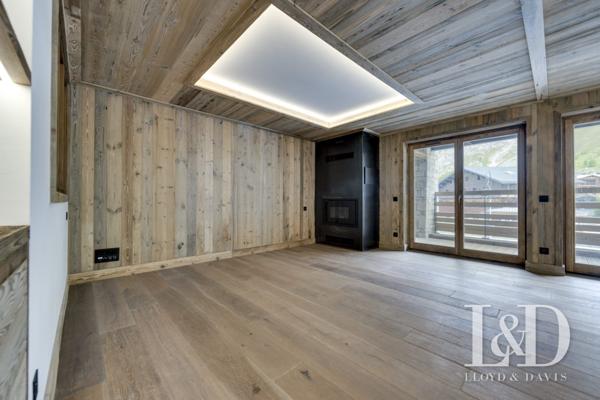 Appartement raffiné dans chalet intimiste, calme absolu à deux pas du centre