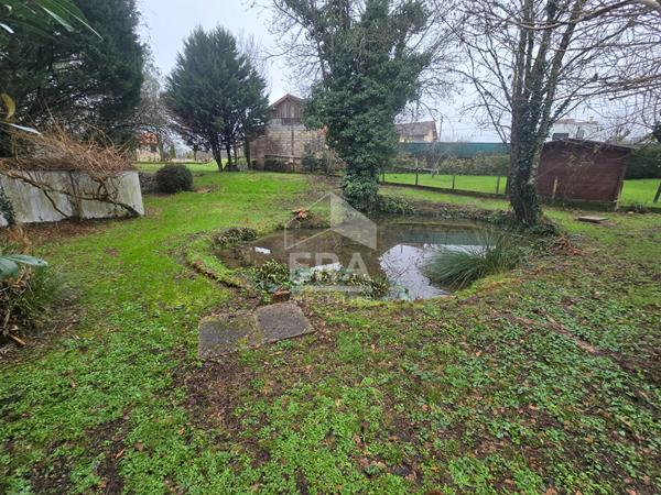 Plain-pied de charme avec source naturelle et fort potentiel