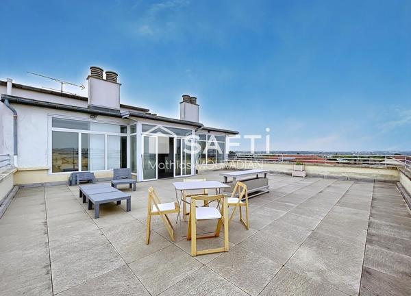 Un dernier étage baigné de lumière avec 25 m² de véranda et une terrasse exceptionnelle de 92 m².