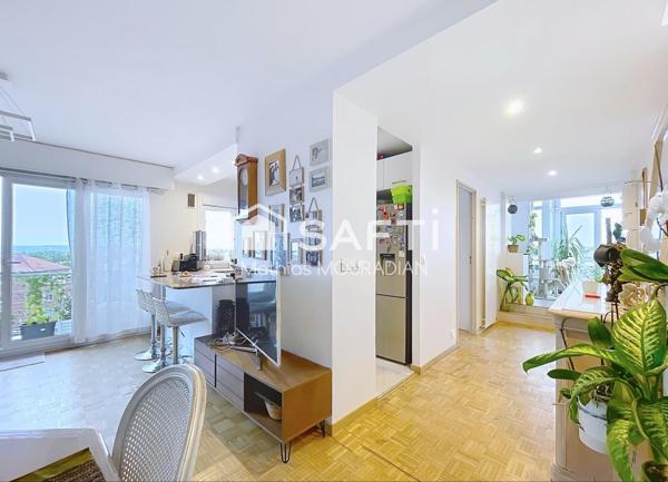 Un dernier étage baigné de lumière avec 25 m² de véranda et une terrasse exceptionnelle de 92 m².