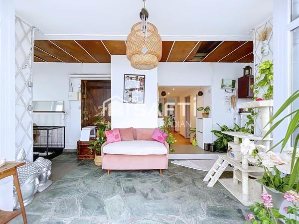 Un dernier étage baigné de lumière avec 25 m² de véranda et une terrasse exceptionnelle de 92 m².
