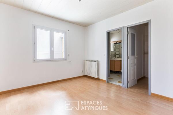 Loft de style industriel et son atrium lumineux