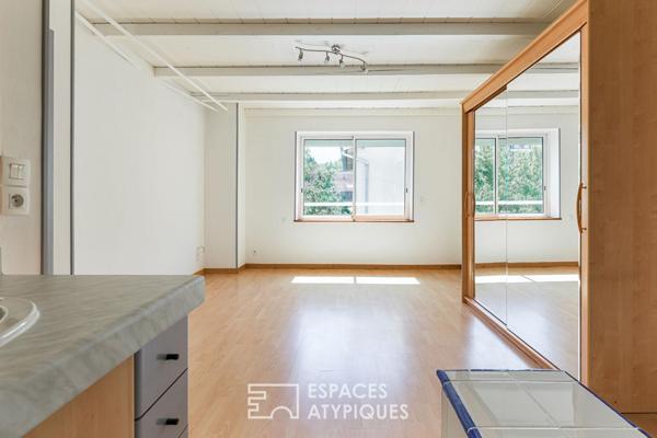 Loft de style industriel et son atrium lumineux