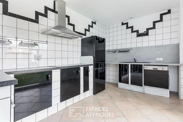 Loft de style industriel et son atrium lumineux