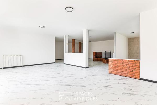 Loft de style industriel et son atrium lumineux