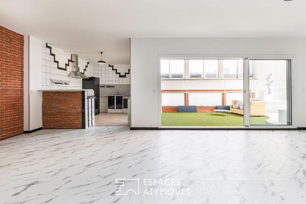 Loft de style industriel et son atrium lumineux
