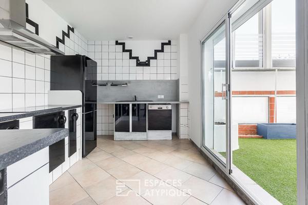 Loft de style industriel et son atrium lumineux