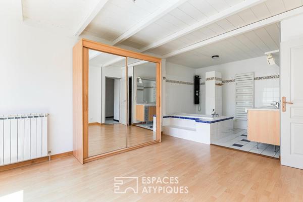 Loft de style industriel et son atrium lumineux