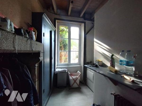 CENTRE BOUG DE BANNALEC POUR CETTE MAISON NICHÉE A L'ABRI DES REGARDS ET DISPOSANT D'UNE COUR E...