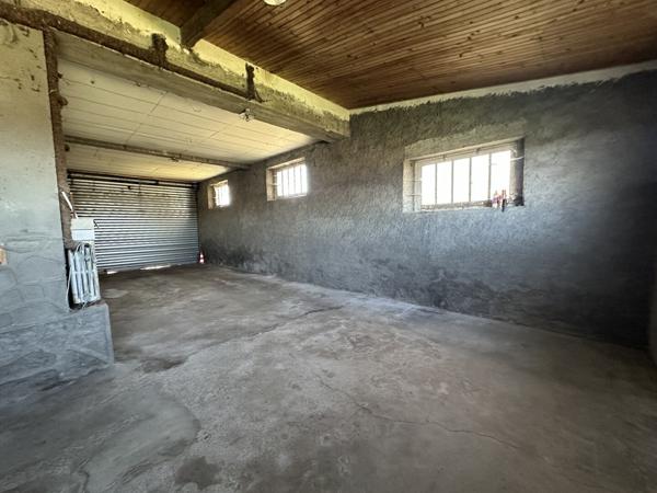 maison avec dépôt et local commercial 110 000 €