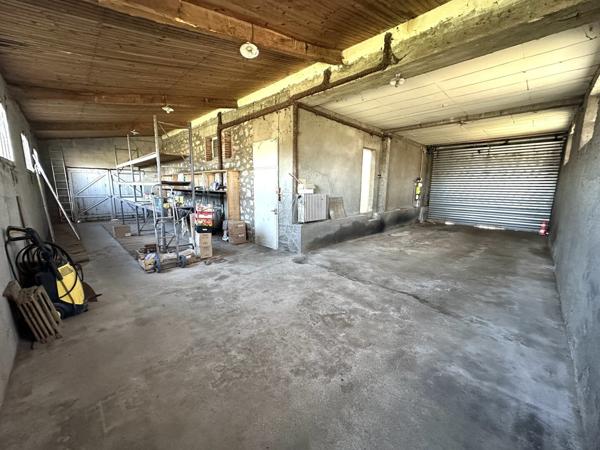 maison avec dépôt et local commercial 110 000 €