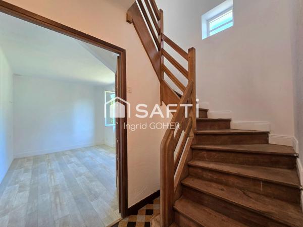 Idéalement située, proche commodités avec jardin et garage