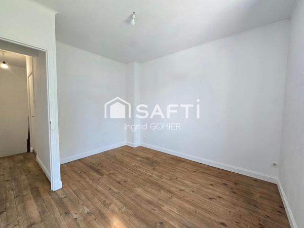 Idéalement située, proche commodités avec jardin et garage