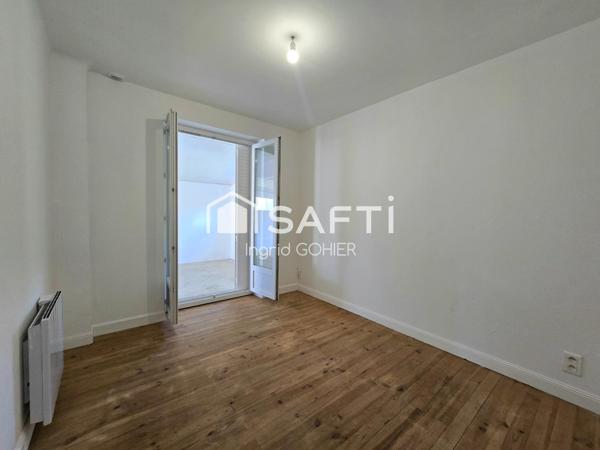 Idéalement située, proche commodités avec jardin et garage