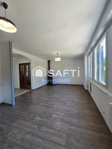 Idéalement située, proche commodités avec jardin et garage